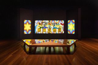 'Rainbow Shabbat', 1992, Judy Chicago and Donald Woodman. Installation view of 'Judy Chicago: A Retrospective' at the de Young Museum. Photography by Gary Sexton. Image provided courtesy of the Fine Arts Museums of San Francisco