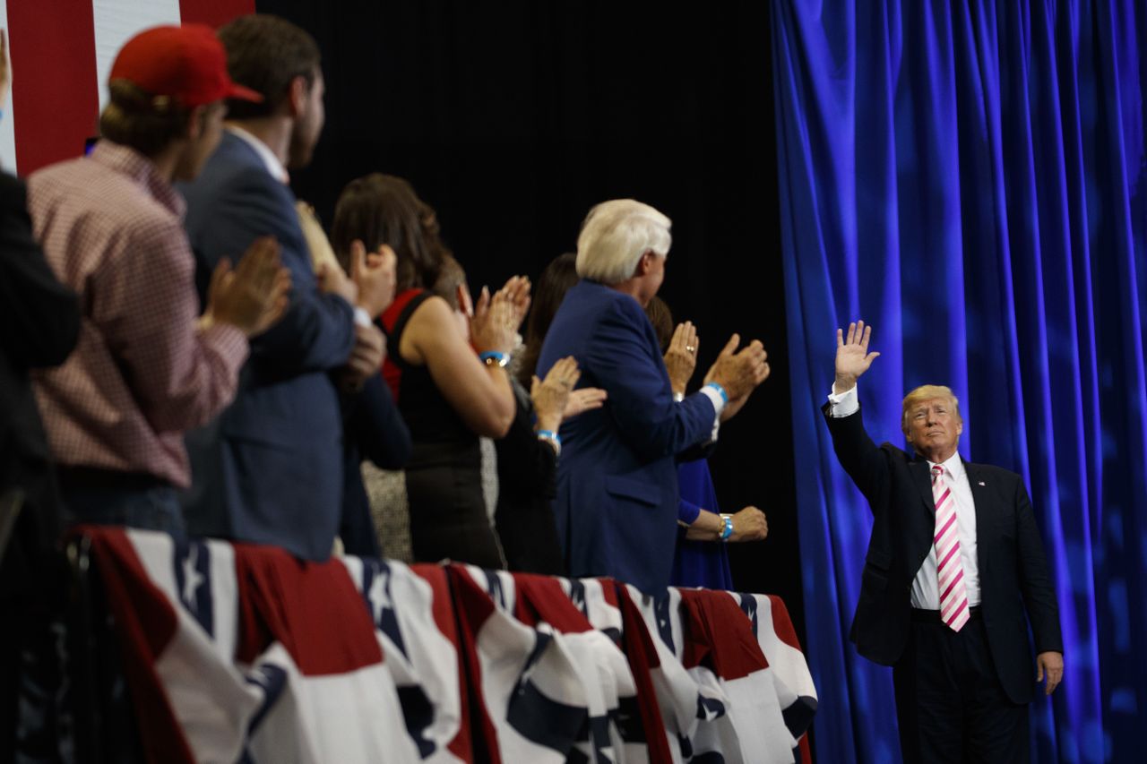 Donald Trump waves to supporters.