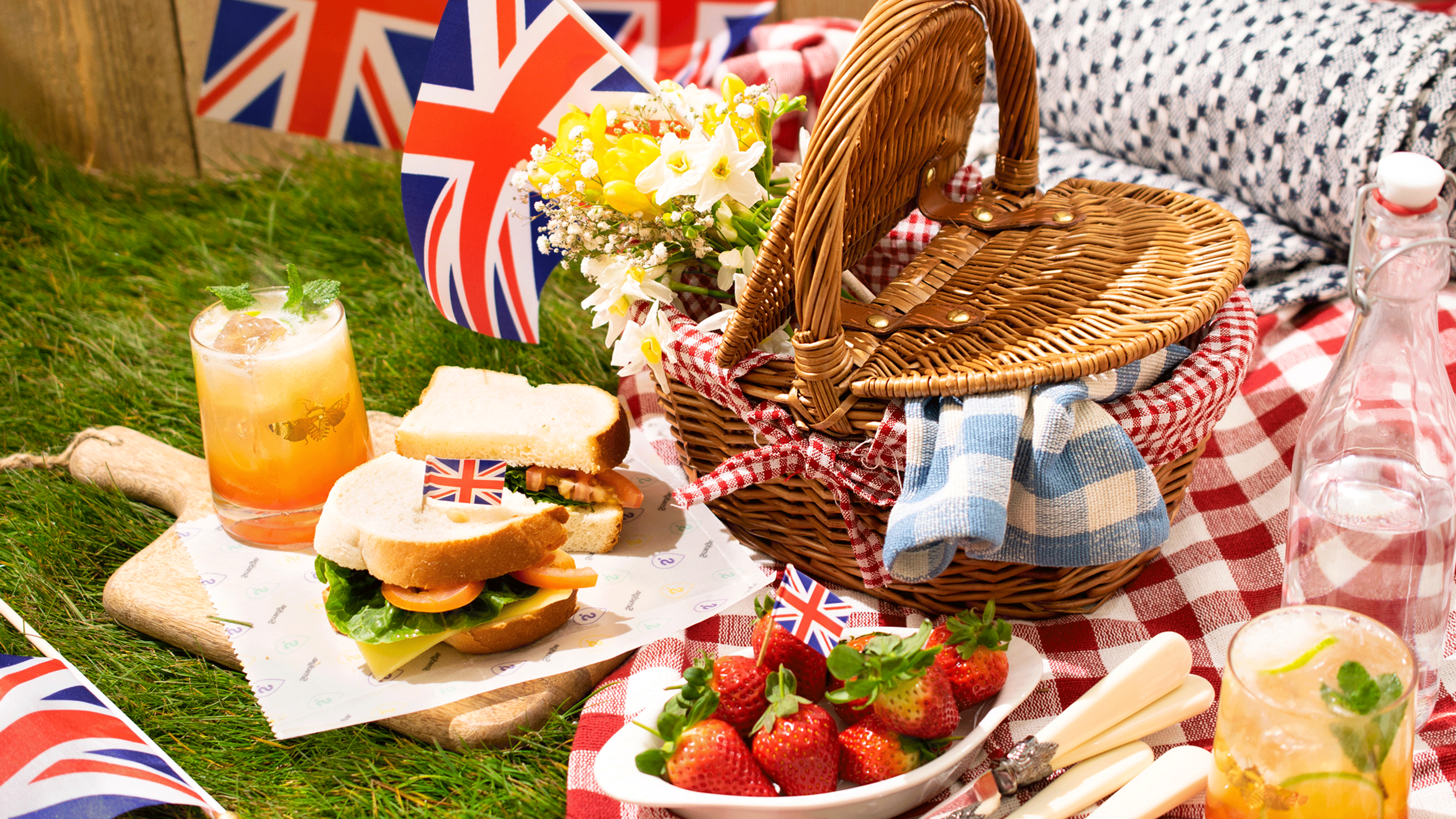coronation picnic with union jack flags in baskets