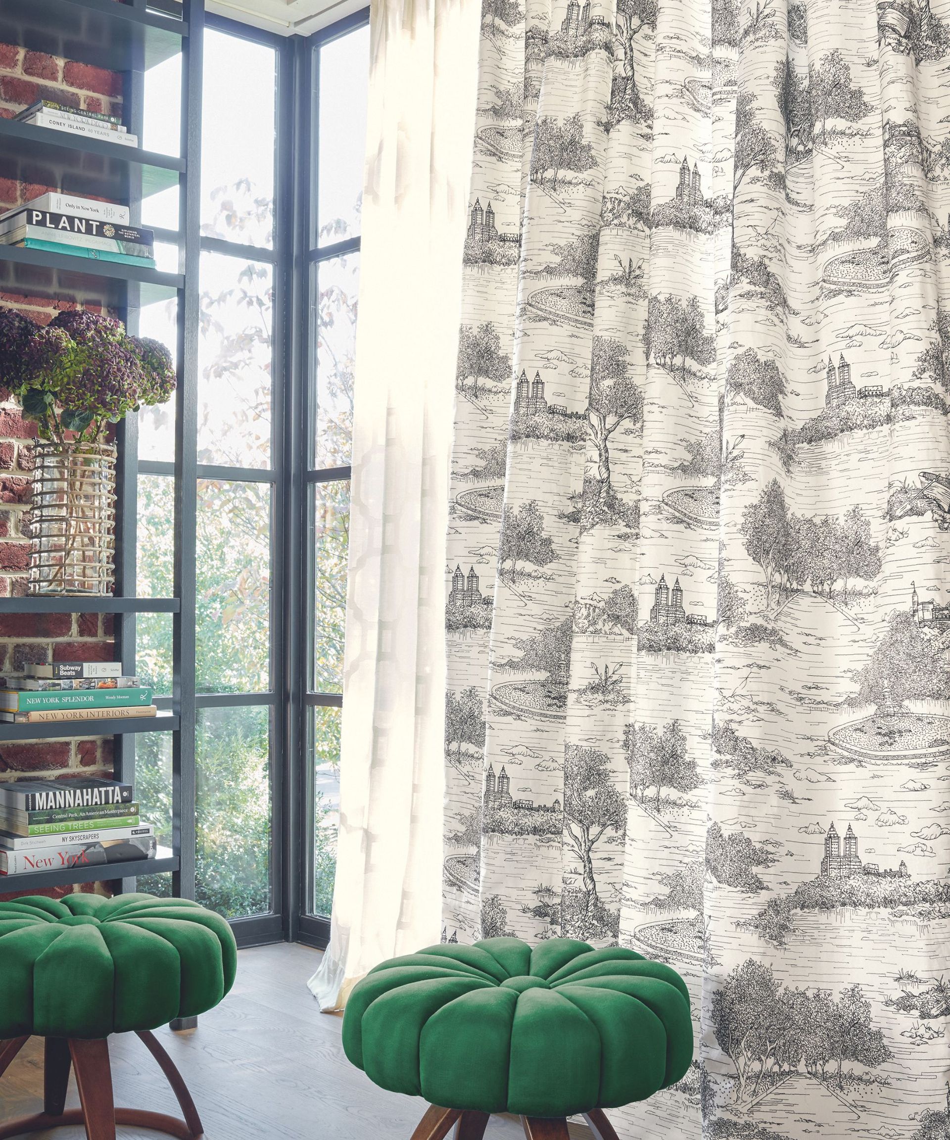 Living room with French decor curtains in front of window and shelves