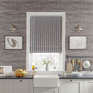 kitchen with wooden wall and widow with blinds