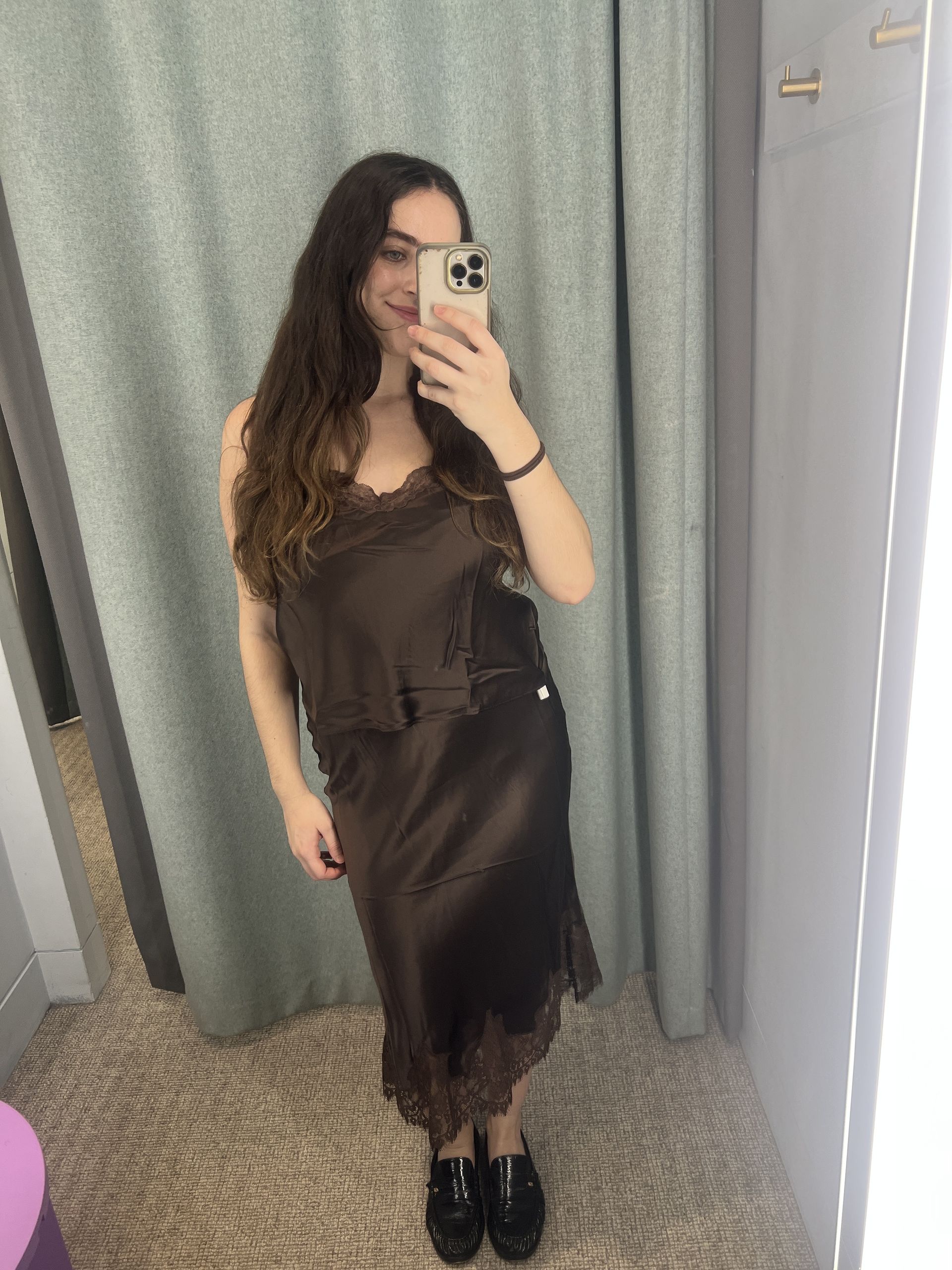 An image of Who What Wear UK's SEO Writer Ava Gilchrist wearing a satin set from Reformation.