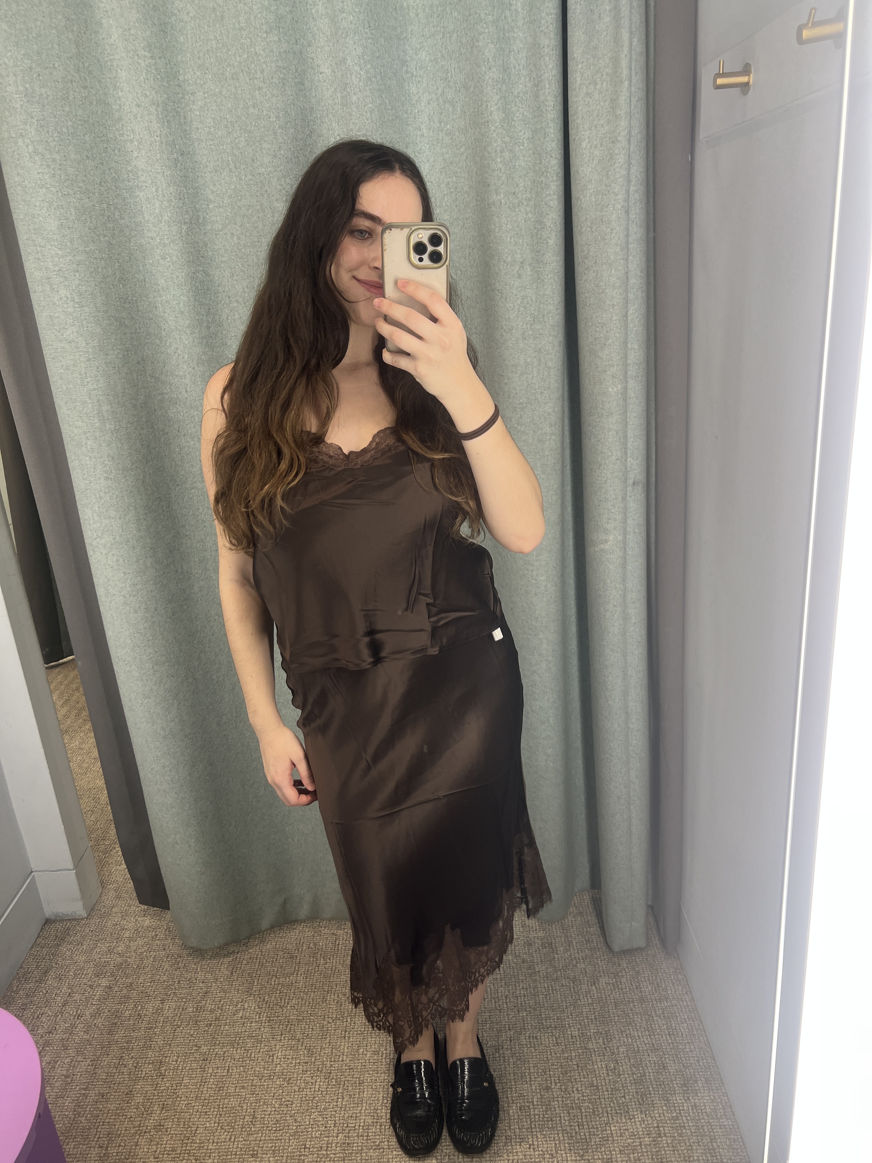 An image of Who What Wear UK's SEO Writer Ava Gilchrist wearing a satin set from Reformation.