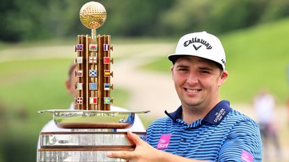 Marcus Armitage poses with the trophy after winning the 2021 Porsche European Open