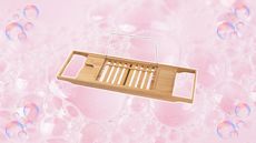 bamboo lidl bath caddy on a pink bubbly background