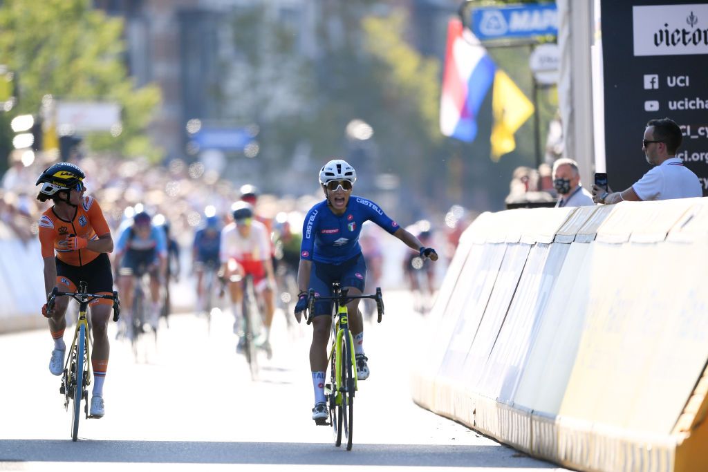 LEUVEN BELGIUM SEPTEMBER 25 Elisa Balsamo of Italy celebrates winning ahead of Marianne Vos of Netherlands during the 94th UCI Road World Championships 2021 Women Elite Road Race a 1577km race from Antwerp to Leuven flanders2021 on September 25 2021 in Leuven Belgium Photo by Tim de WaeleGetty Images