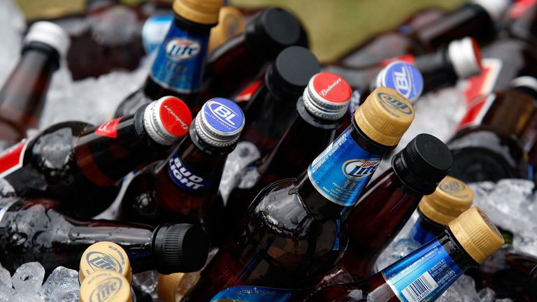 Bottle, Alcohol, Bottle cap, Drink, Alcoholic beverage, Glass bottle, Drinkware, Collection, Label, Beer bottle,