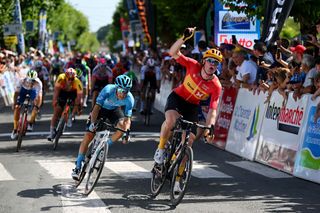 MATHA FRANCE AUGUST 22 Søren Wrenskjold of Norway and Team UnoX Pro Cycling celebrates at finish line as stage winner ahead of Giovanni Lonardi of Italy and Team EOLO Kometa during the 36th Tour Poitou Charentes en Nouvelle Aquitaine 2023 Stage 1 a 1952km stage from Confolens to Matha on August 22 2023 in Matha France Photo by Dario BelingheriGetty Images