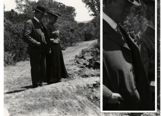 1906 photograph of a man and woman at the spot where the San Andreas Fault broke across Alpine Road during the San Francisco earthquake. Buttons on the man's jacket confirm the photo was not printed in reverse.