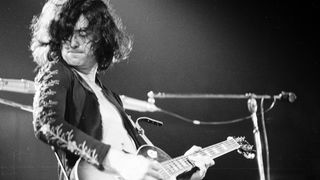 Jimmy Page performs live with Led Zeppelin