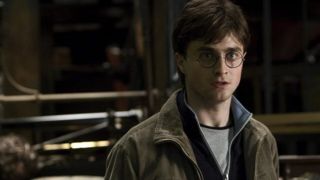 Daniel Radcliffe as Harry Potter.