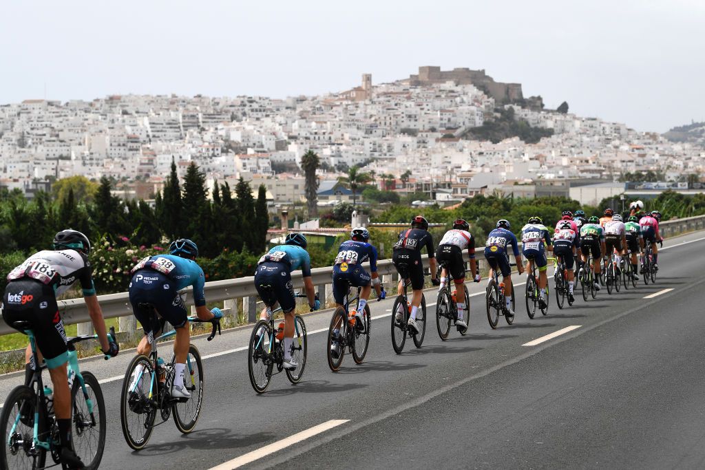 RINCON DE LA VICTORIA SPAIN AUGUST 24 LR Damien Howson of Australia and Team BikeExchange Luis Leon Sanchez Gil of Spain and Team Astana Premier Tech and a general view of the Breakaway passing through Salobrea Village during the 76th Tour of Spain 2021 Stage 10 a 189km stage from Roquetas de Mar to Rincn de la Victoria lavuelta LaVuelta21 on August 24 2021 in Rincon De La Victoria Spain Photo by Tim de WaeleGetty Images