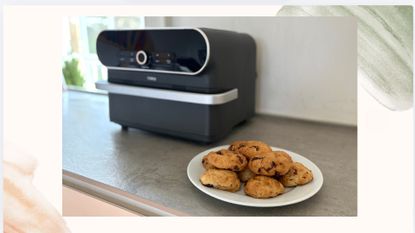 Tower Elite Flexi Drawer Air Fryer with a plate of cookies on a watercolour background