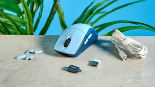 A Glacier Blue Corsair M75 wireless gaming mouse for Mac