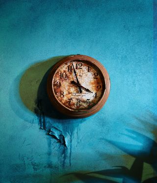 Clock on blue wall