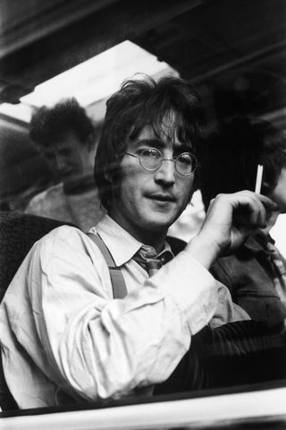 Lit up, Lennon enjoying a tab during the filming of The Magical Mystery Tour in September 1967