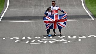 Gold medalist Bethany Shriever and silver medalist Kye Whyte celebrate Olympic success on the BMX track