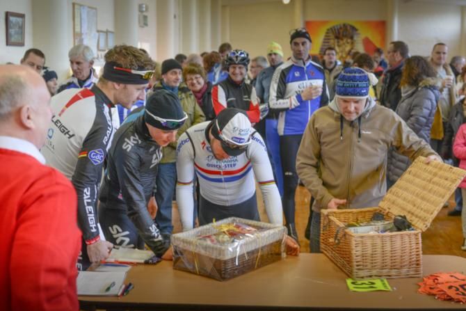 Mark Cavendish gets a good look at his winnings