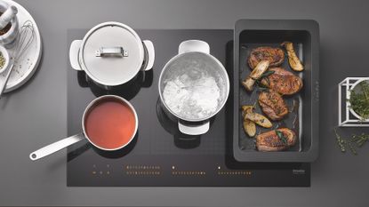 What is an induction hob, and how does it work?