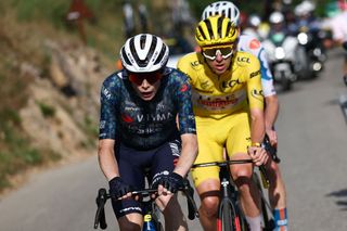 UAE Team Emirates team's Slovenian rider Tadej Pogacar, wearing the overall leader's yellow jersey and Team Visma - Lease a Bike team's Danish rider Jonas Vingegaard cycle in the final ascent of the Col de la Coutille during the 20th stage of the 111th edition of the Tour de France cycling race, 132,8 km between Nice and Col de la Couillole, southeastern France, on July 20, 2024. (Photo by Anne-Christine POUJOULAT / AFP)