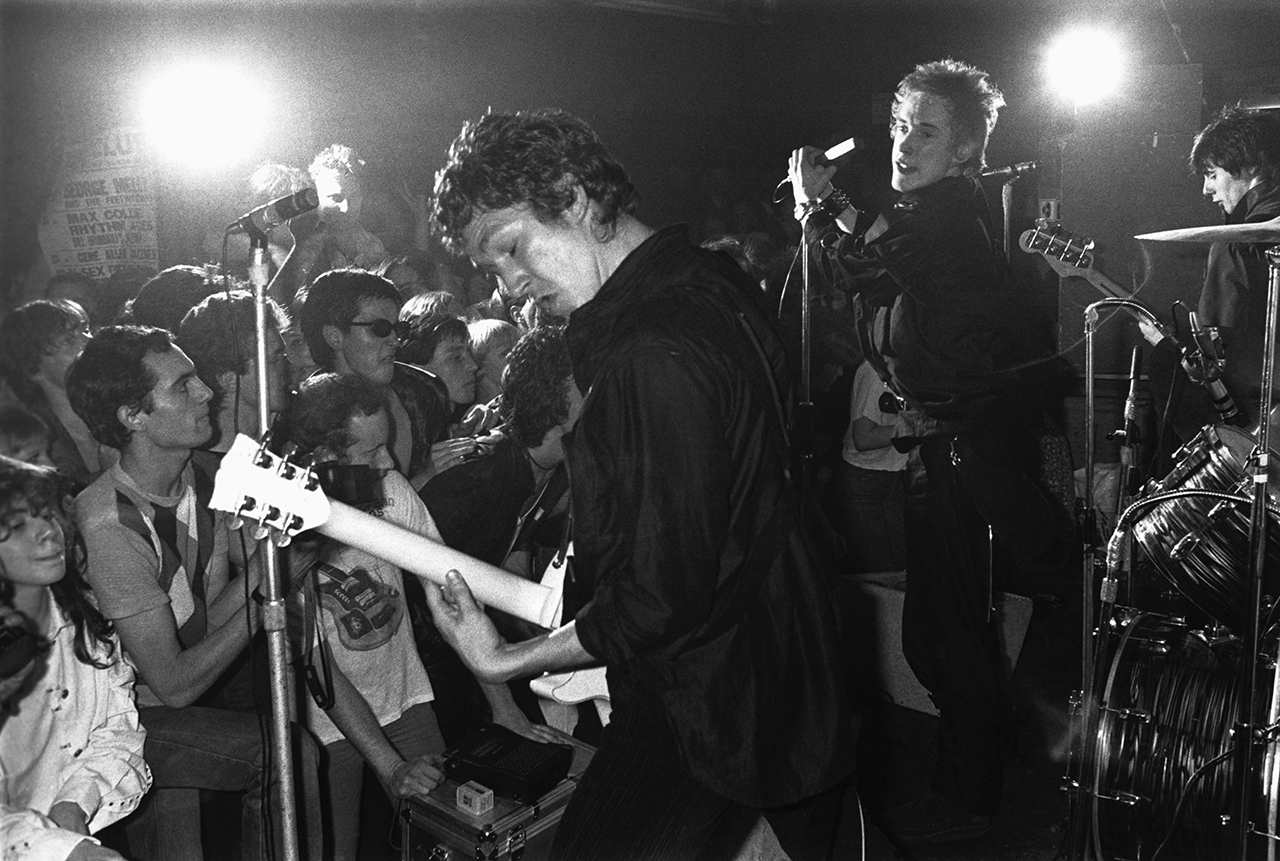 The Sex Pistols perform at the 100 Club in London: Steve Jones, Johnny Rotten, Glen Matlock.