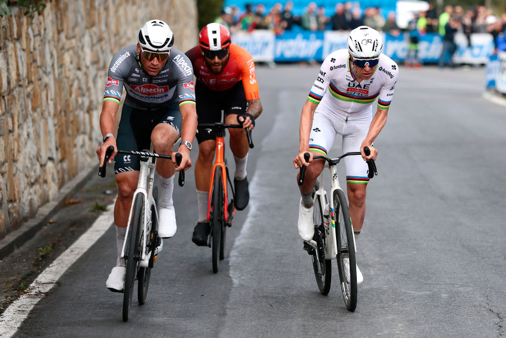 SANREMO, ITALY - MARCH 22: (L-R) Mathieu Van Der Poel of Netherlands and Team Alpecin &amp;ndash; Deceuninck, Filippo Ganna of Italy and Team INEOS Grenadiers and Tadej Pogacar of Slovenia and Team UAE Team Emirates compete in the breakaway during the 116th Milano-Sanremo 2025 a 289km one day race from Pavia to Sanremo / #UCIWT / on March 22, 2025 in Sanremo, Italy. (Photo by Luca Bettini - Pool/Getty Images)