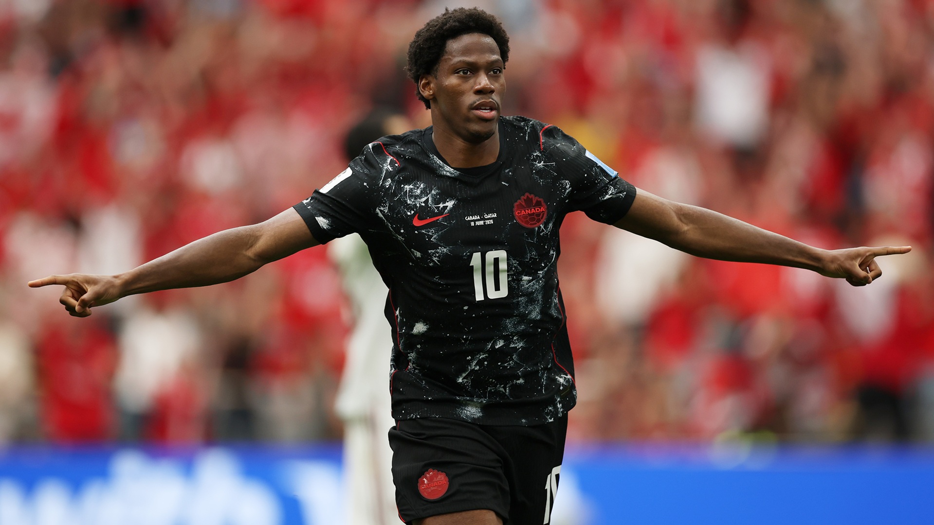 VANCOUVER, BRITISH COLUMBIA - JUNE 18: Jonathan David #10 of Canada celebrates scoring his team's second goal during the FIFA World Cup 2026 Group B match between Canada and Qatar at BC Place Vancouver on June 18, 2026 in Vancouver, British Columbia. (Photo by Jared C. Tilton - FIFA/FIFA via Getty Images)