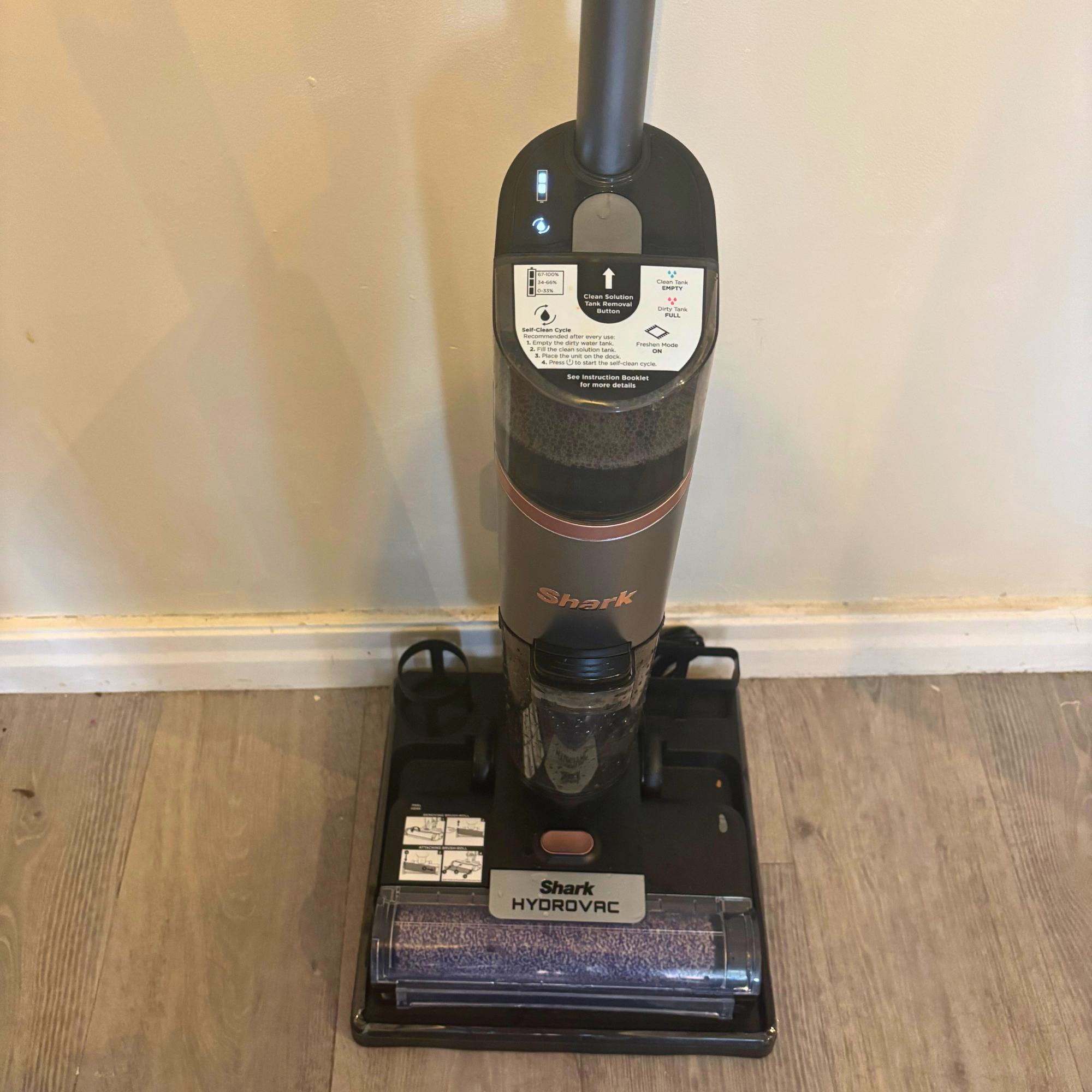 Shark HydroVac Cordless Hard Floor Cleaner positioned on docking station