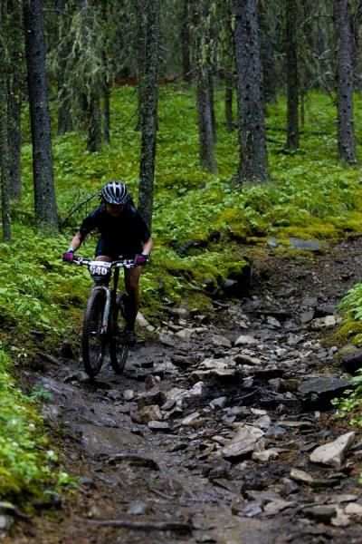 Battling along the track in the wet conditions