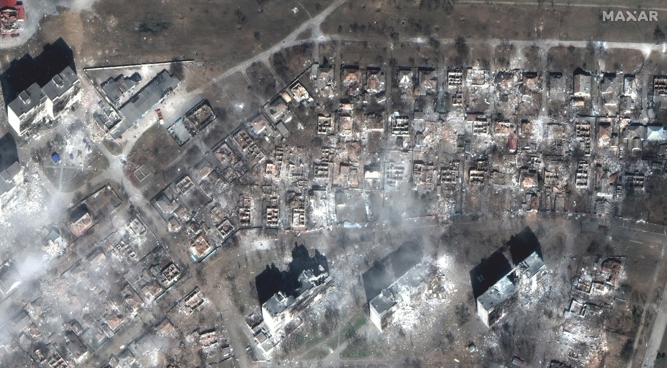 Maxar Technologies' WorldView-3 satellite captured this photo of apartment buildings and homes destroyed by Russian shelling in the Ukrainian city of Mariupol.