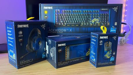 Razer Fortnite special edition gaming accessories boxed on a wooden desk