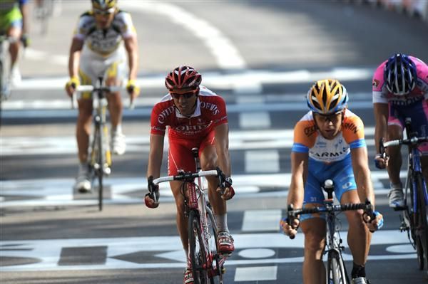 The remainder of the breakaway crosses the finish line in Besan&ccedil;on