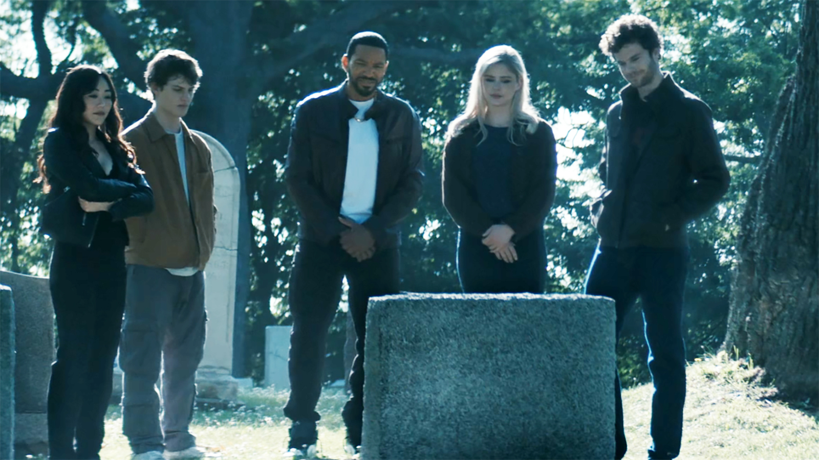Kimiko, Ryan, Mother's Milk, Starlight, and Hughie standing and looking at Butcher's grave in The Boys season 5 episode 8