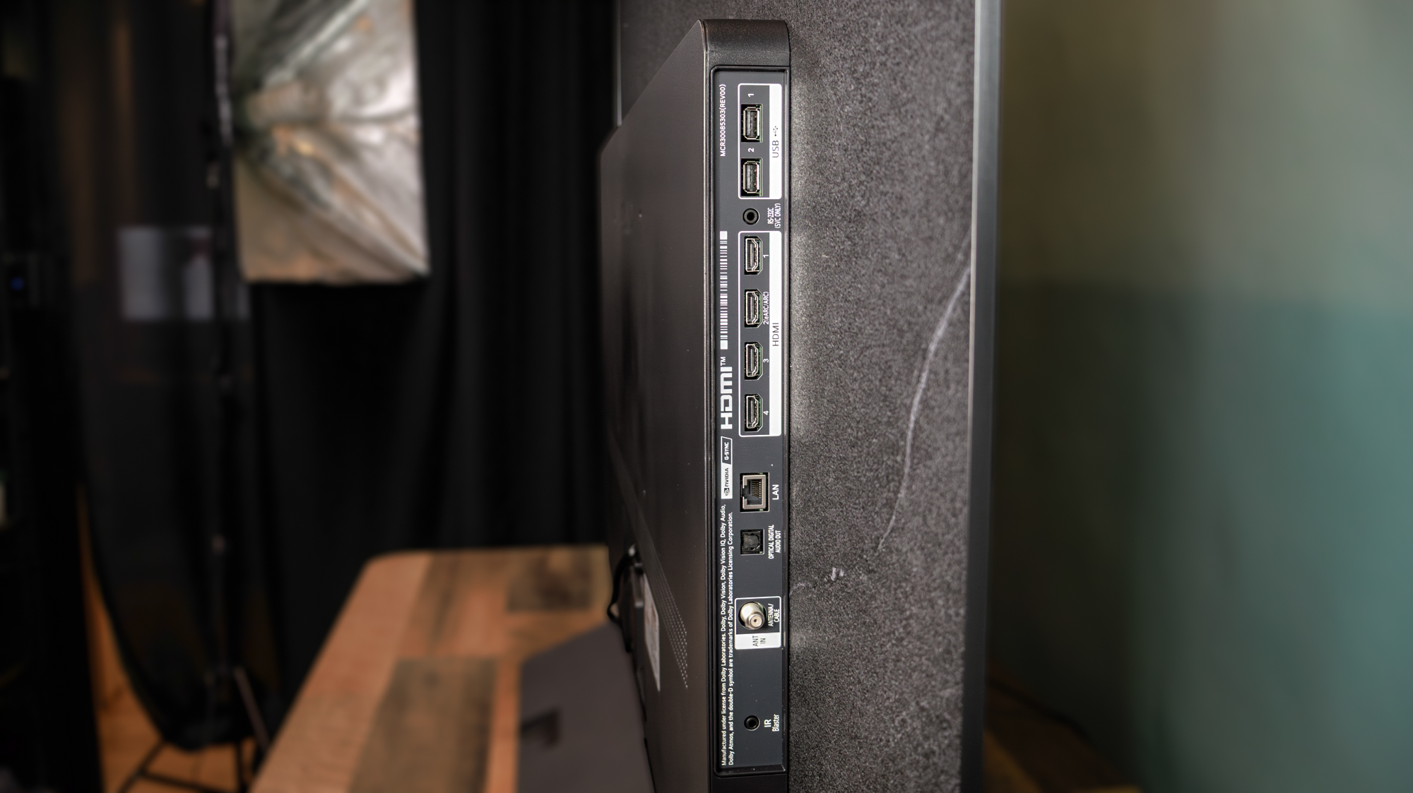 LG C6 OLED TV shown on a wood table