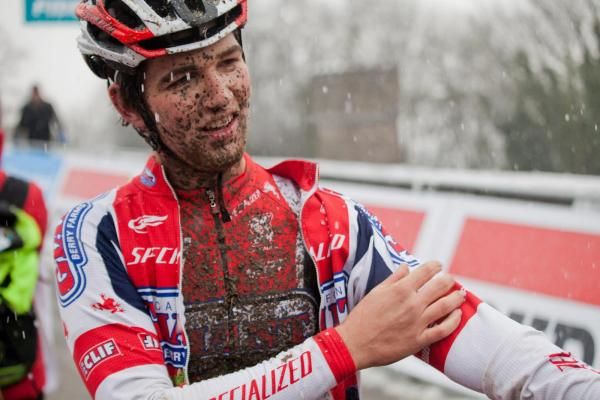 Tobin Ortenblad gets warm in the chill post-race at Namur.