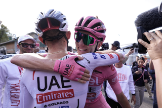 Pogačar celebrates winning stage 8 of the Giro d'Italia with teammates
