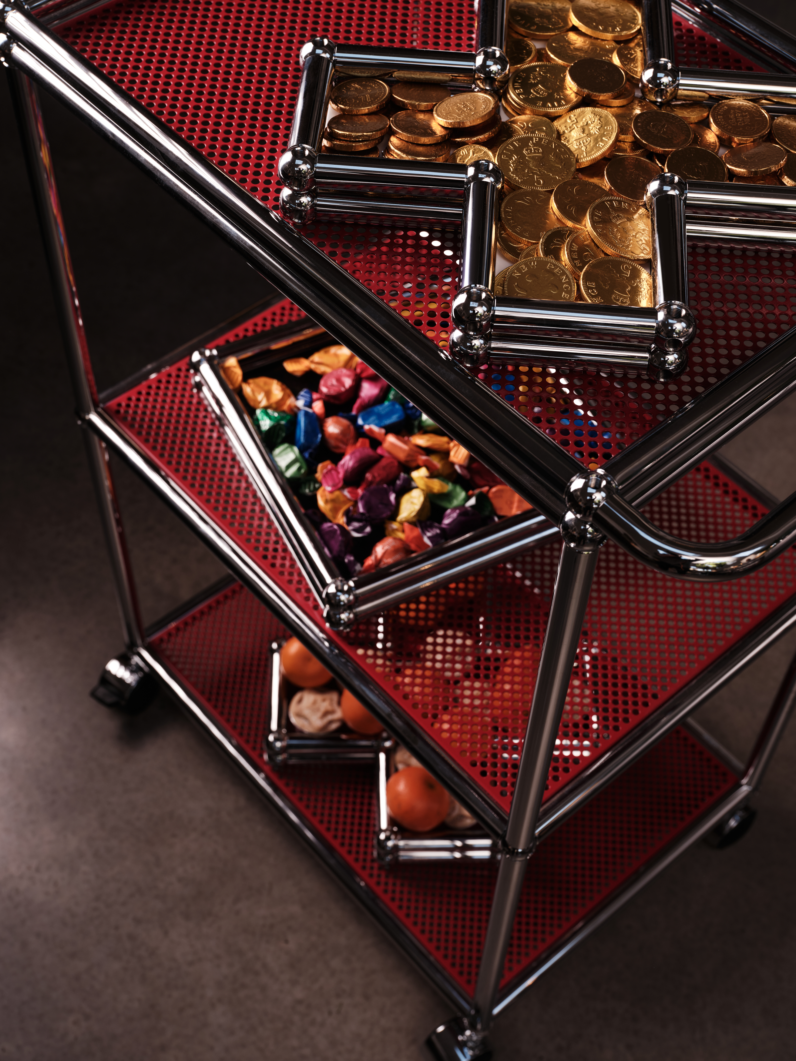 A series of shots depicting a festive Christmas tree, flowers, candles, and accessories setup.