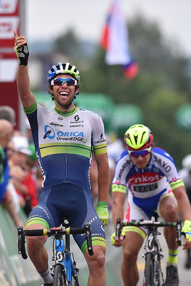 Michael Matthews (Orica-GreenEdge) points to the sky as he wins the stage 4 sprint in Schwarzenbach