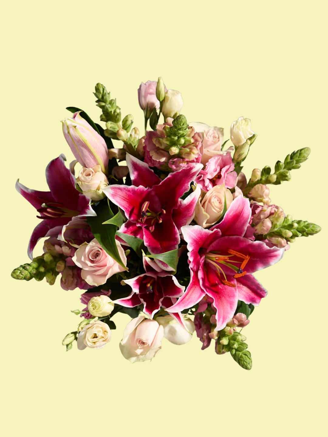 A colorful floral arrangement with lilies, roses, and lisianthus