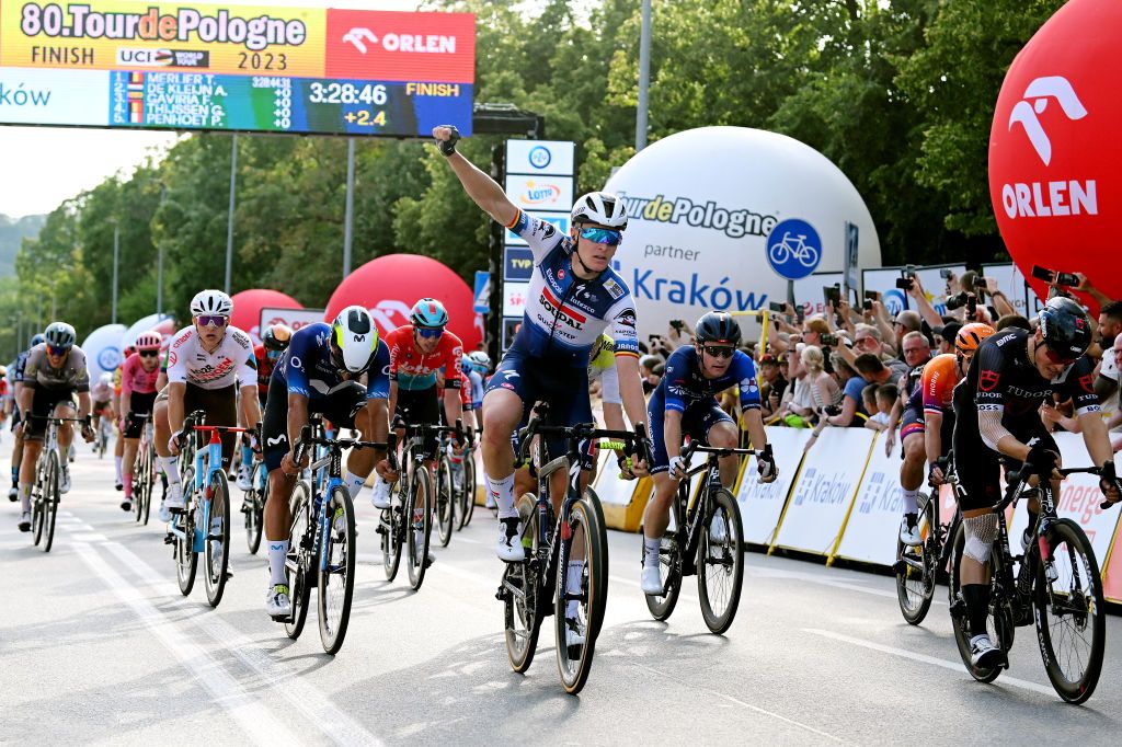 KRAKOW POLAND AUGUST 04 Tim Merlier of Belgium and Team Soudal Quick Step celebrates at finish line as stage winner during the 80th Tour de Pologne 2023 Stage 7 a 1666km stage from Zabrze to Krakw UCIWT on August 04 2023 in Krakw Poland Photo by Dario BelingheriGetty Images