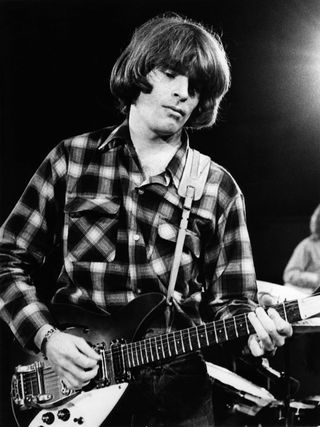 John Fogerty performs with his Rickenbacker 325 in 1970