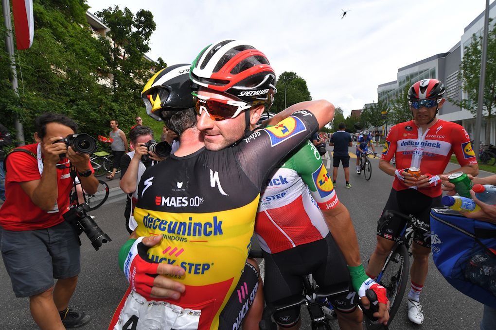 Elia Viviani is congratulated after winning stage 4 at Tour de Suisse