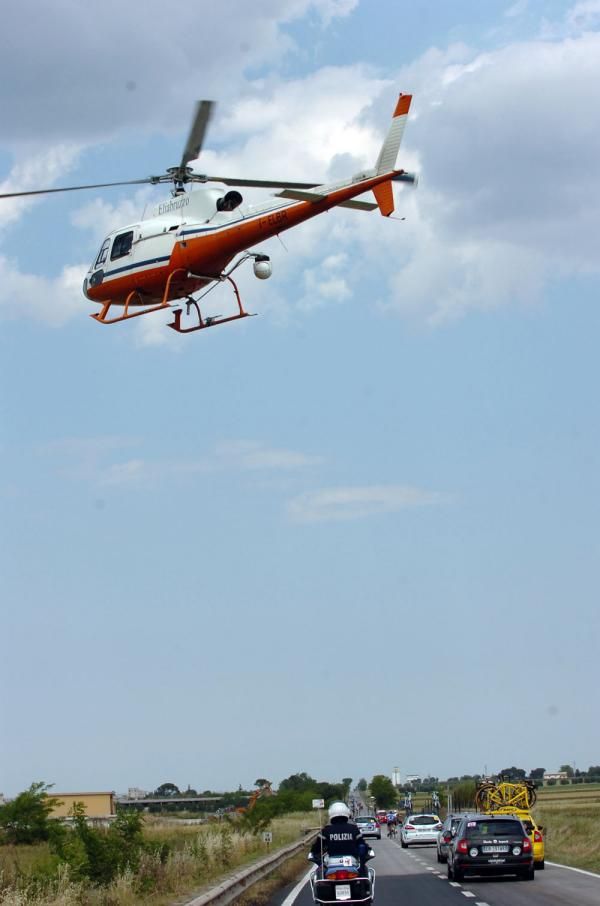 The television helicopter hovers over the breakaway on stage ten