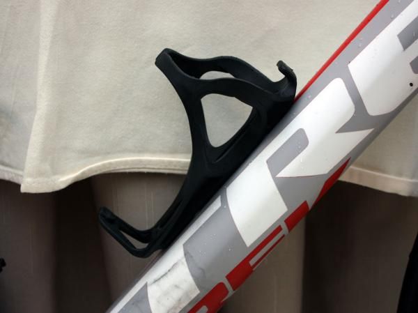 Armstrong has long preferred the Trek Bat Cage for its secure bottle holding ability.