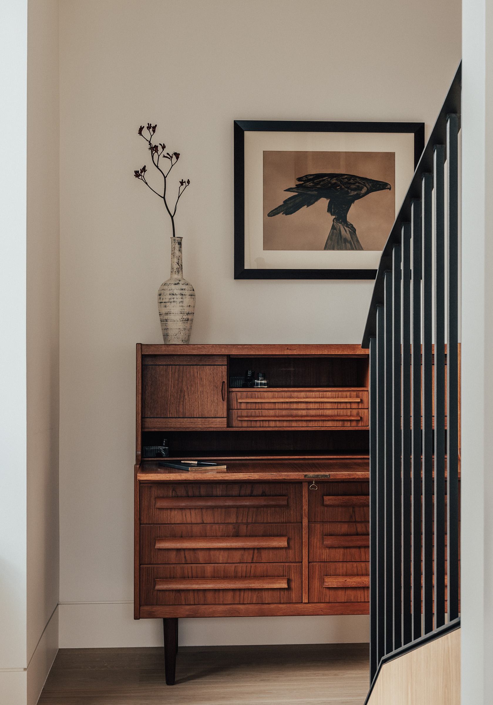 The apartment also serves as a showcase for the clients' collection of art and furniture