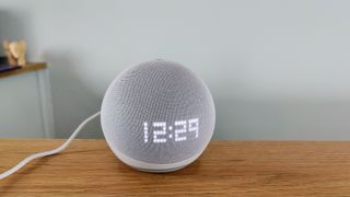 Amazon Echo Dot with Clock (2022) review: smart speaker with time displayed on a shelf