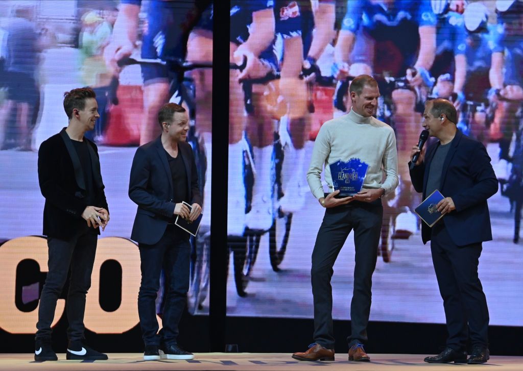 Jonas Van Geel Jelle Cleymans Tim Declercq winner of the Ploegmaat van het jaar award and Sports journalist Karl Vannieuwkerke pictured during the Flandrien award ceremony for the best Belgian cyclist of the 2021 cycling season organized by newspaper Het Nieuwsblad in Puurs on Tuesday 26 October 2021BELGA PHOTO DAVID STOCKMAN Photo by DAVID STOCKMANBELGA MAGAFP via Getty Images