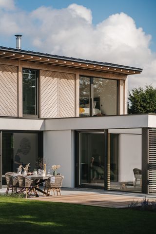 exterior detail of hampshire home with external terrace for dining