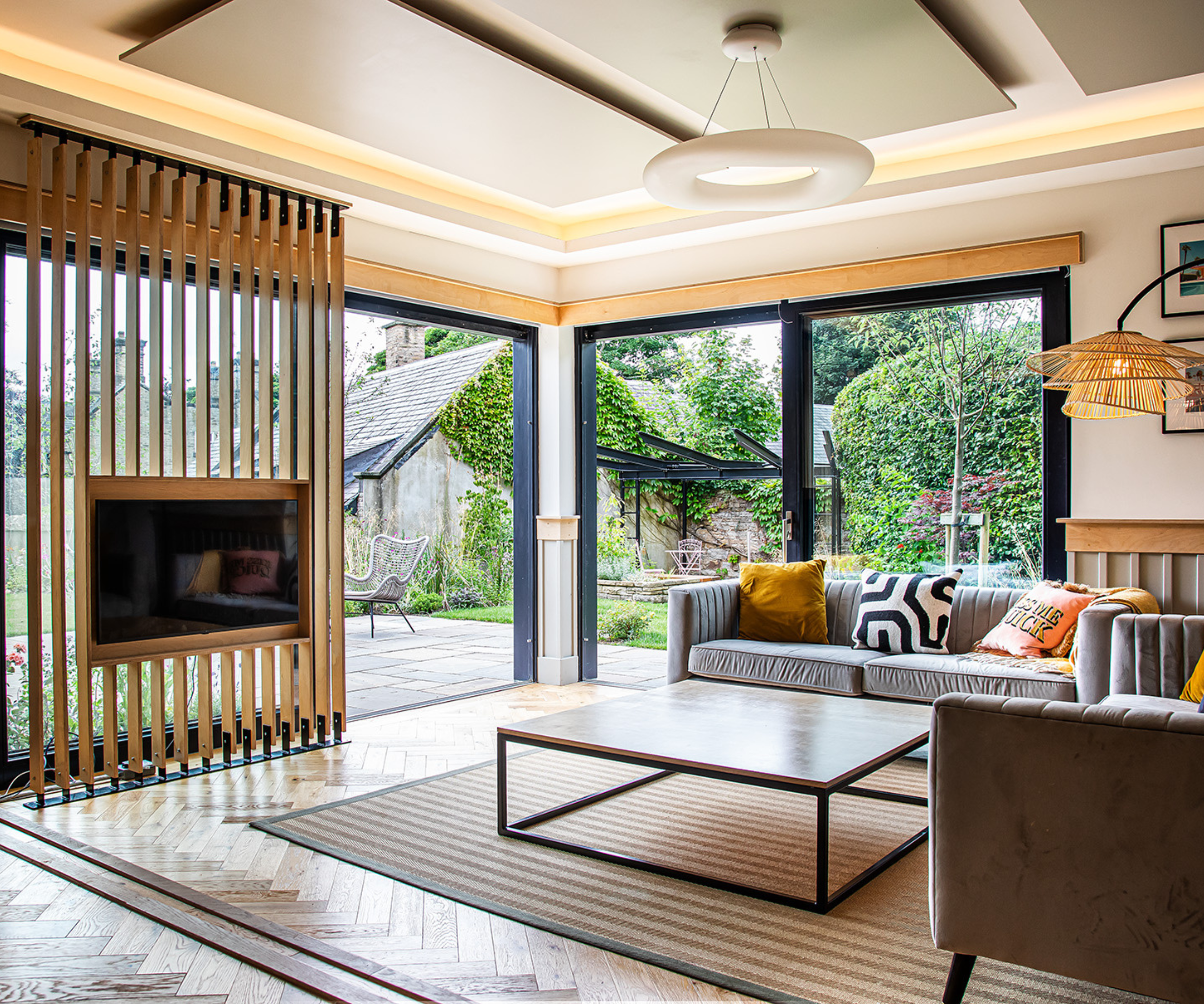 Living room with large patio doors overlooking the garden