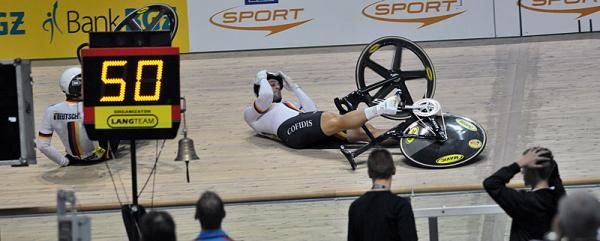 Germany's Maximilian Levy and Michael Seidenbecher crashed in their second round keirin heat.